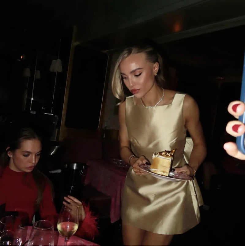 Mozision Backless Bow Sexy Mini Dress Women Robe Fashion Solid O Neck Sleeveless High Waist Club Party Elegant Dress Clubwear