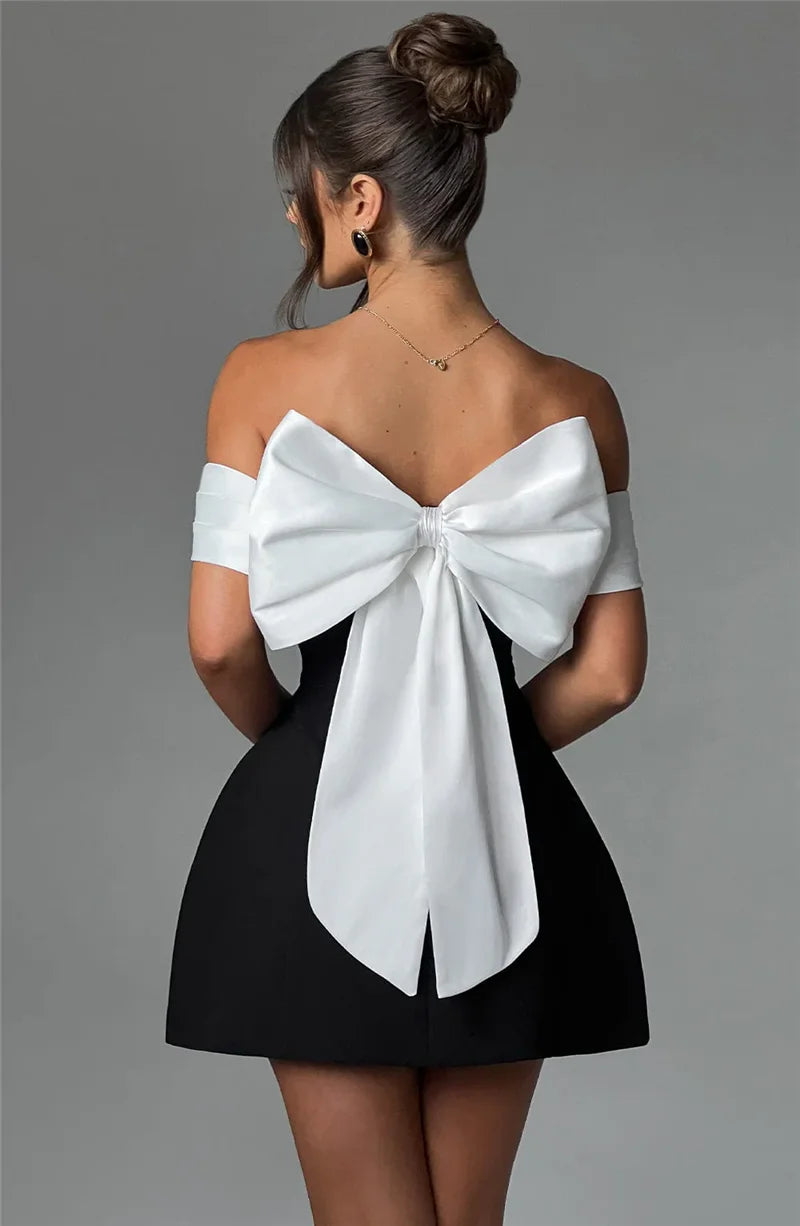 Mozision Bow Backless Sexy Mini Dress For Women Robe Elegant Off-shoulder Strapless Sleeveless A-line Club Sexy Dress Vestido