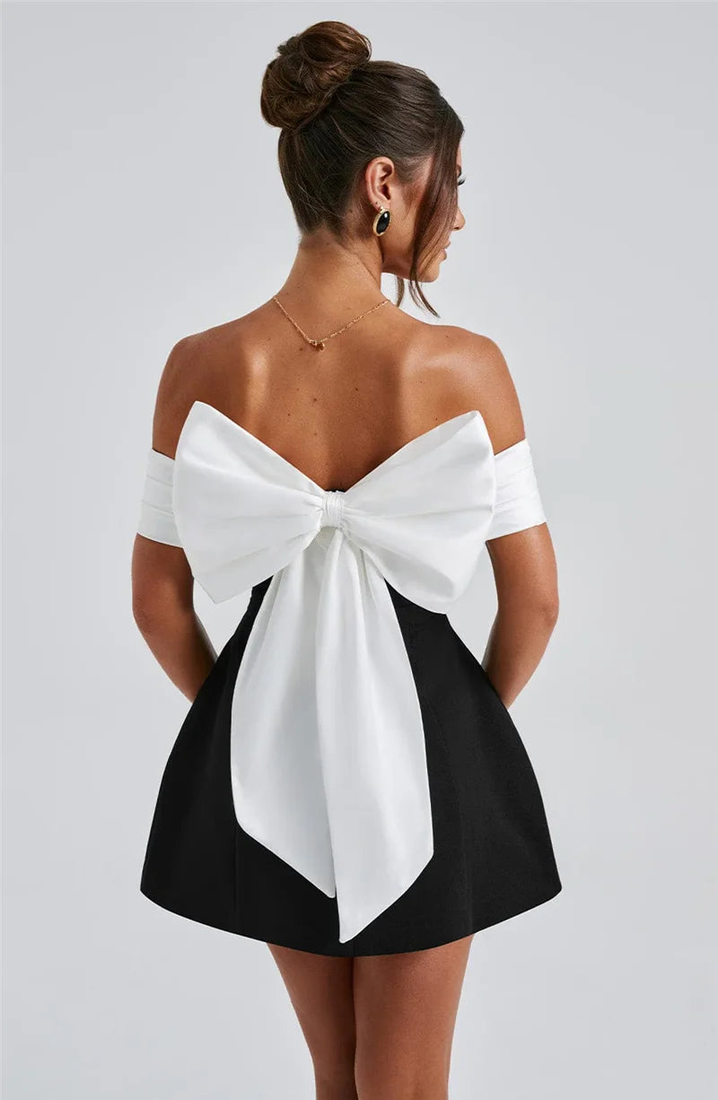 Mozision Bow Backless Sexy Mini Dress For Women Robe Elegant Off-shoulder Strapless Sleeveless A-line Club Sexy Dress Vestido